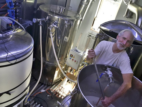 Cliff Goodman in his new three-barrel brewery. Goodman will host an open house and ribbon untying ceremony for his new facilities from noon to 5 p.m. on Sunday