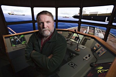 Doug Pine stands in the simulator at Pacific Maritime Institute.