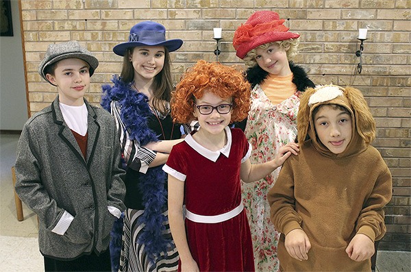 The cast of “Annie Jr.” includes