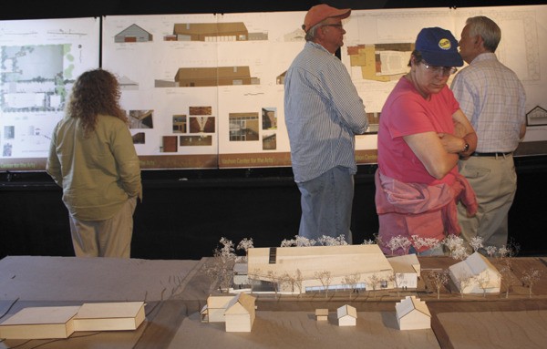 Visitors check out the architectural renderings at one of VAA’s recent open houses.
