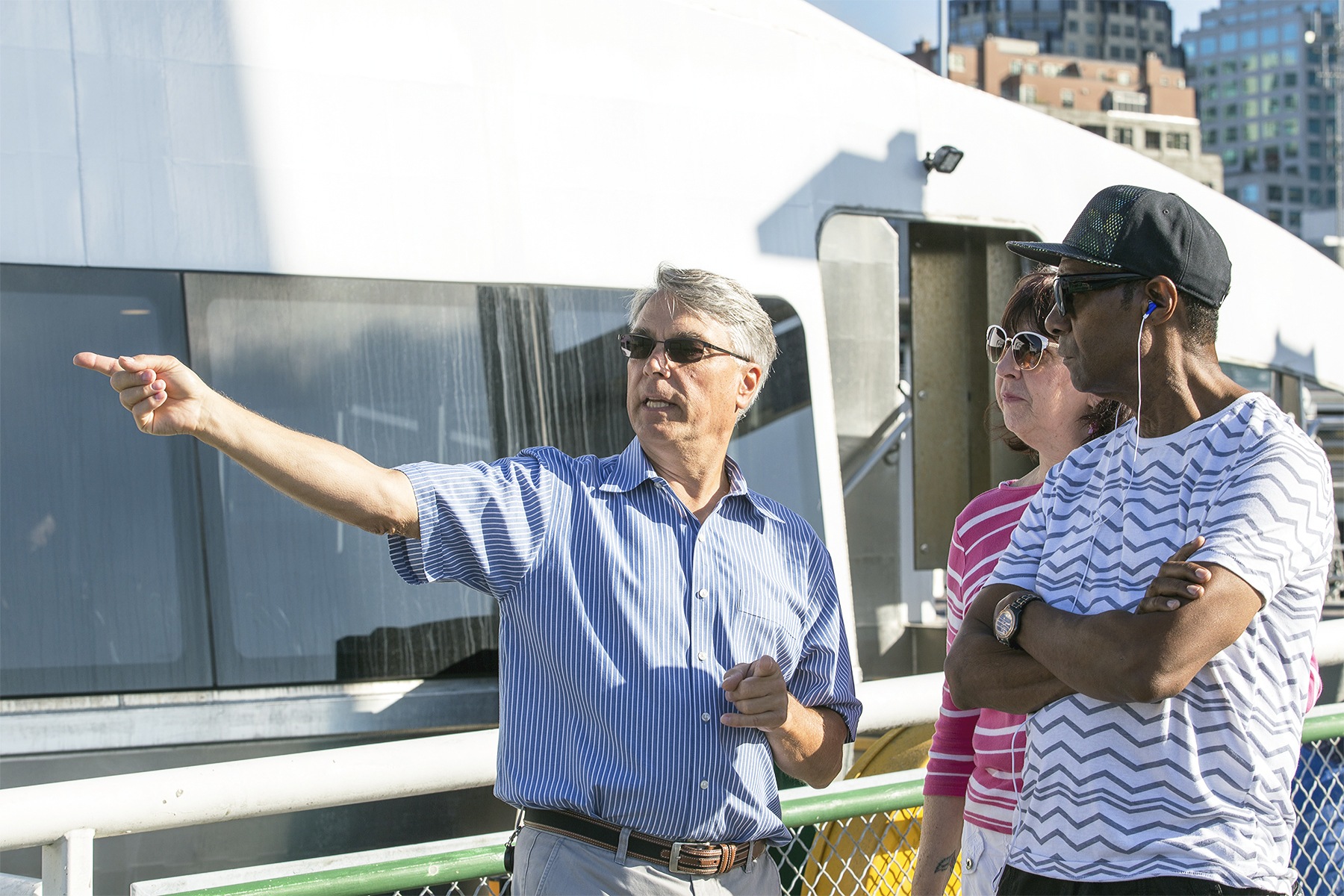 Ned Ahrens/King County PhotoKing County Marine Division Director Paul Brodeur talks to pedestrians in Seattle about the division’s water taxi service. The levy that funds the service is expiring this year and needs to be not just renewed