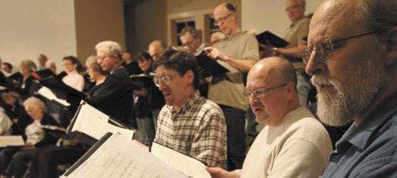 Chorale members sing at a recent rehearsal. The choir’s latest concert features a lineup of pieces that were all written by Vashon composers or people connected to the Island.