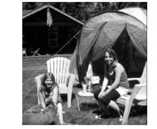 Genevieve Rauma and Anneke Steneker enjoy a “staycation” in the Rauma backyard.