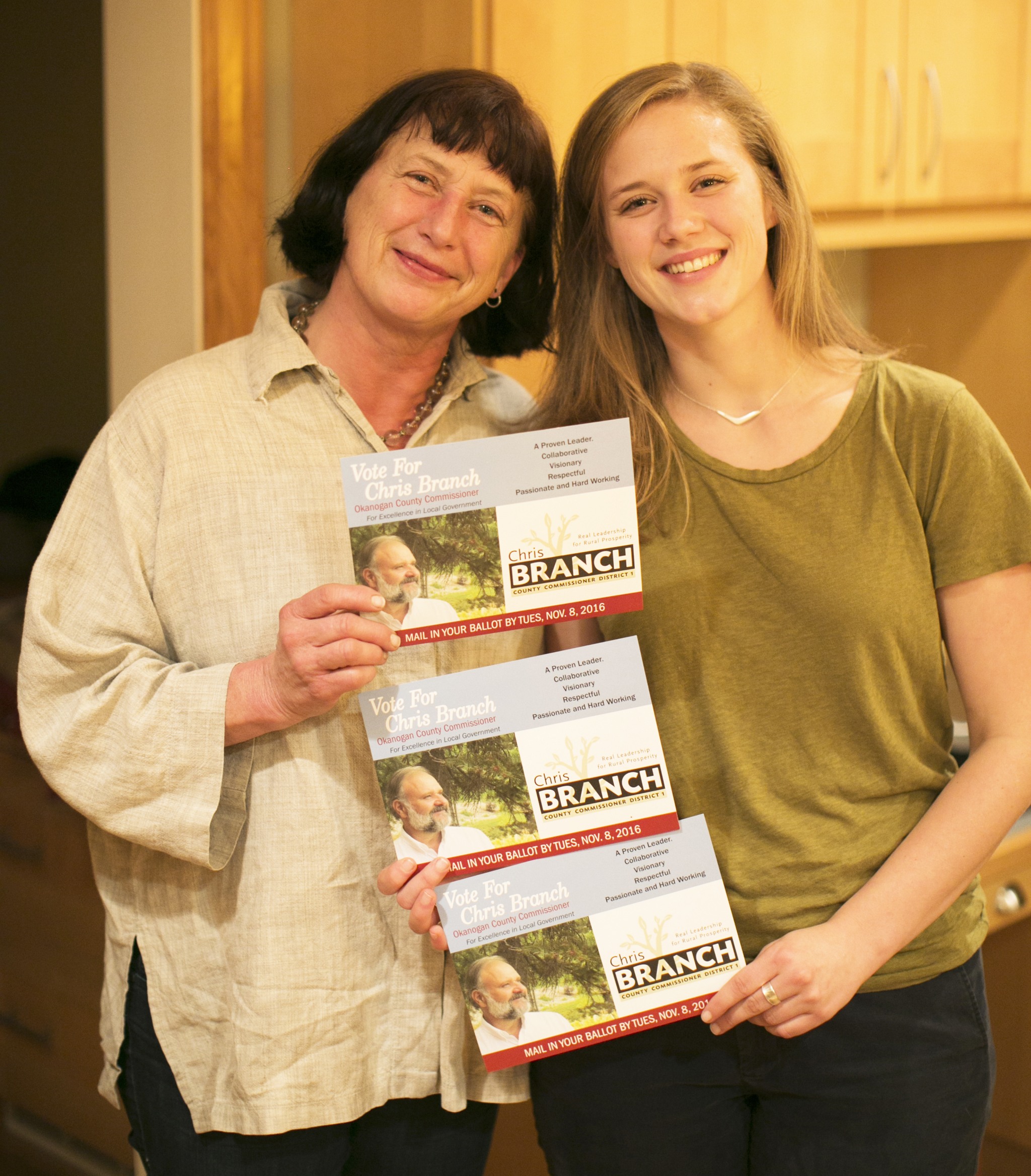 Courtesy Photo                                Nancy (left) and Trudy Soriano hold a flier for commissioner Chris Branch.