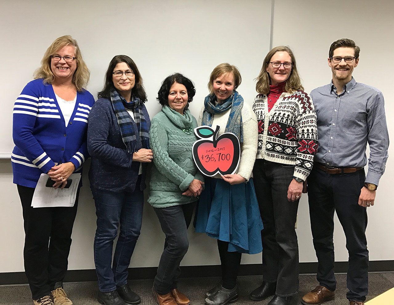 Left to right: PIE board co-presidents Ingrid Peterson and Sandie McTighe with Chautauqua Elementary School’s Glenda Berliner and Aristy Gill, McMurray Middle School’s Lea Heffernan and Vashon High School’s Jordan Browning. (Toby Holmes Photo)