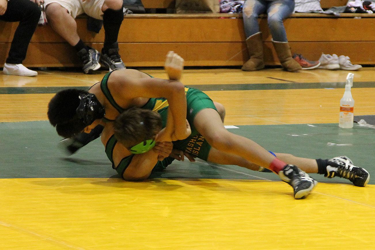 Two Pirate wrestlers take first place at annual Rock Island tournament