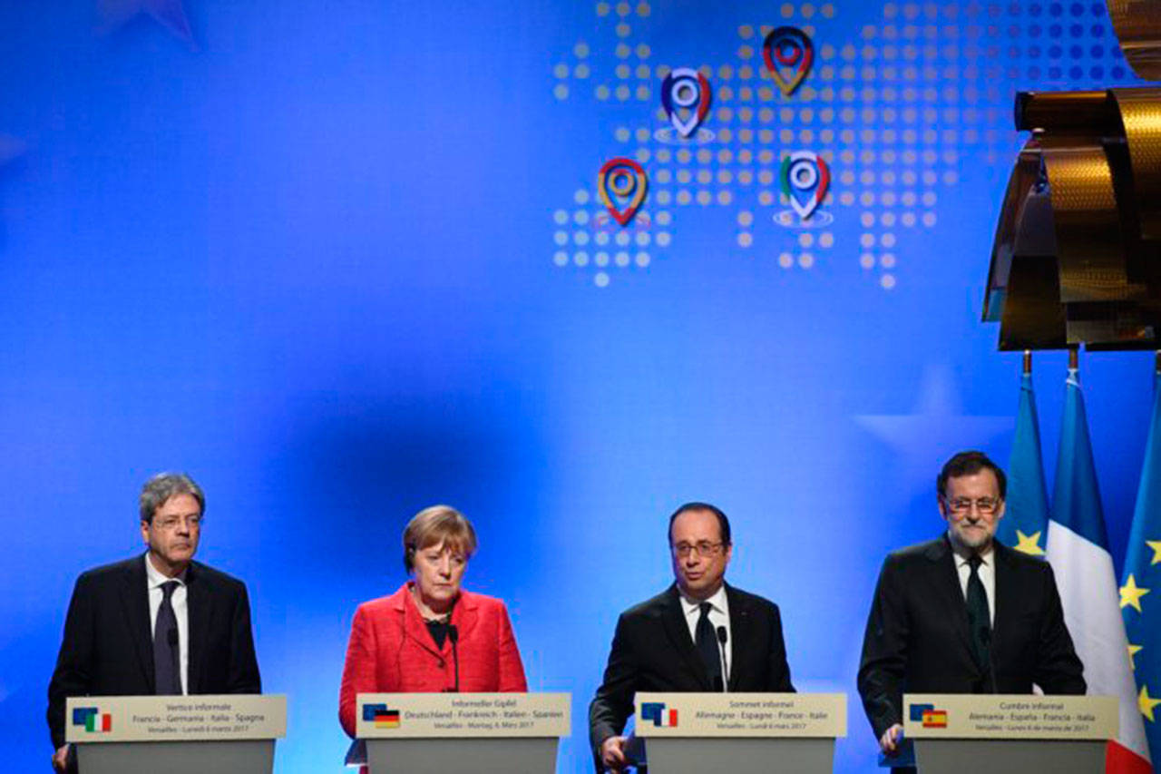 From left to right: Italian premier Paolo Gentiloni, German Chancellor Angela Merkel, French President François Hollande and Spanish Prime Minister Mariano Rajoy deliver joint statements following the informal summit on Brexit in Versailles (Martin Bureau/AFP via Getty Images)