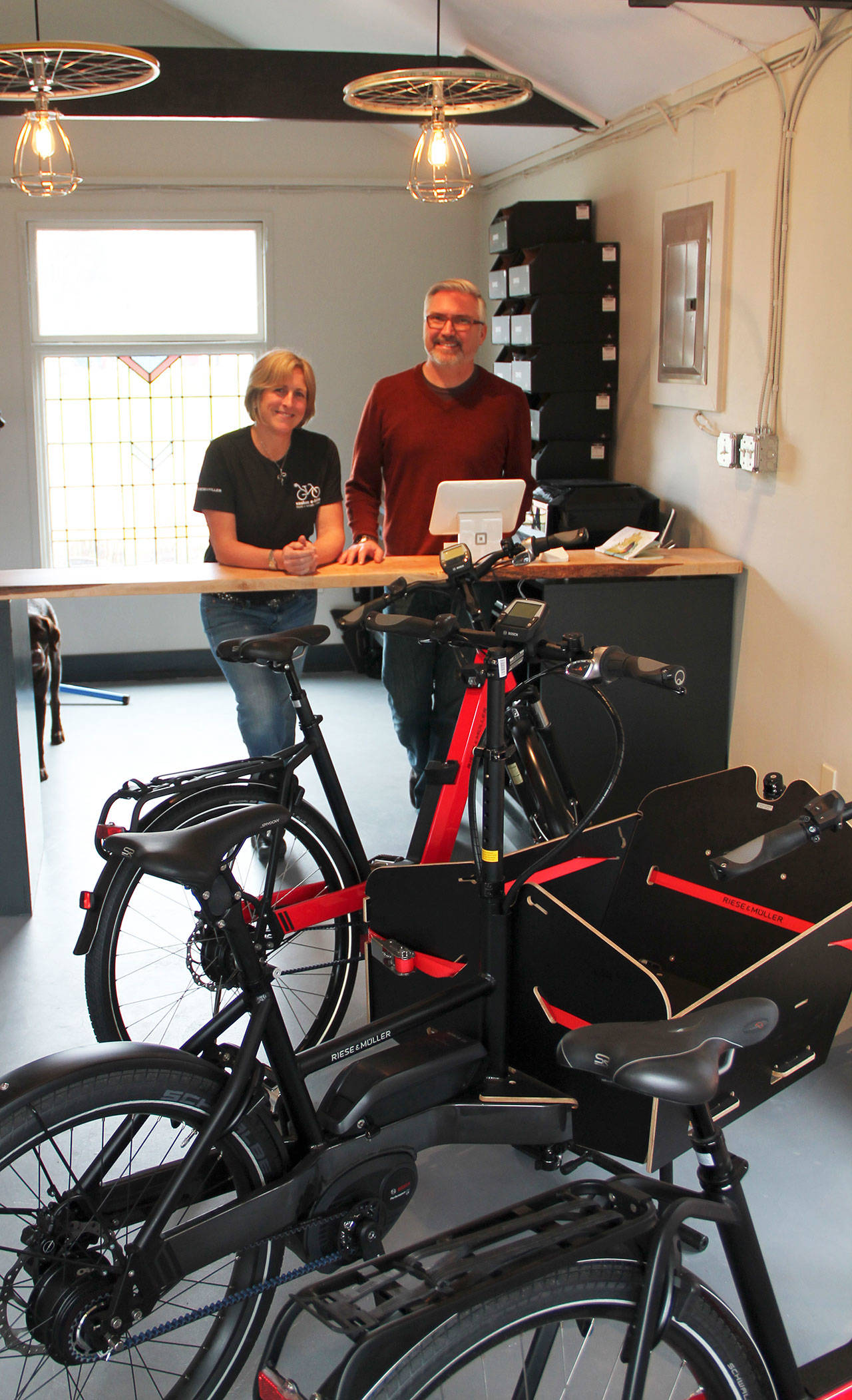 Erin and Doug Kieper at their new business, Vashon E-Bike. (Anneli Fogt/Staff Photo)