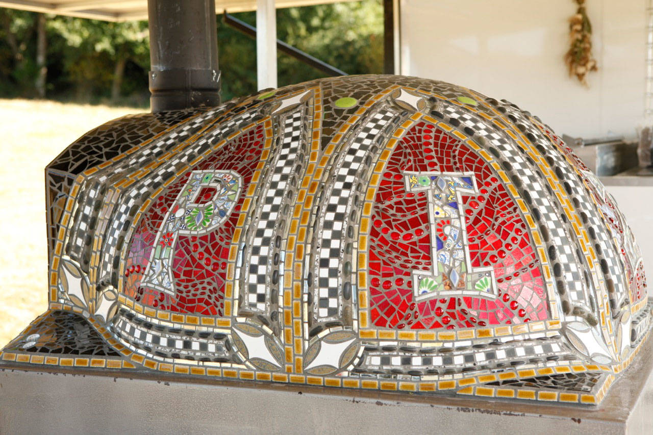 Collaborating Vashon artists create mosaic pizza ovens