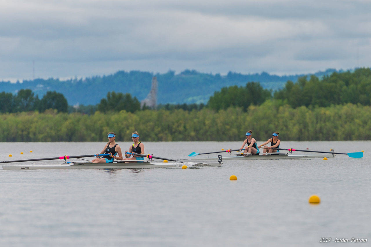 VIRC junior crew members Riley Lynch and Rhea Enzian (right) and Selena Mildon and Kate Kelly (left) row in the varsity women’s pair event at U.S. Rowing’s Northwest Junior Regional Championships at Vancouver Lake on Saturday. (Jordan Petram Photo)