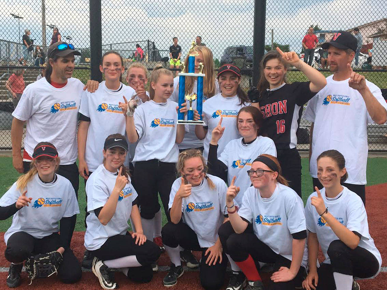 The Rock Island Rockettes celebrate their West Seattle Girls Softball U15 championship on June 7. The team was undefeated this season, with a record of 17-0. (Courtesy photo)