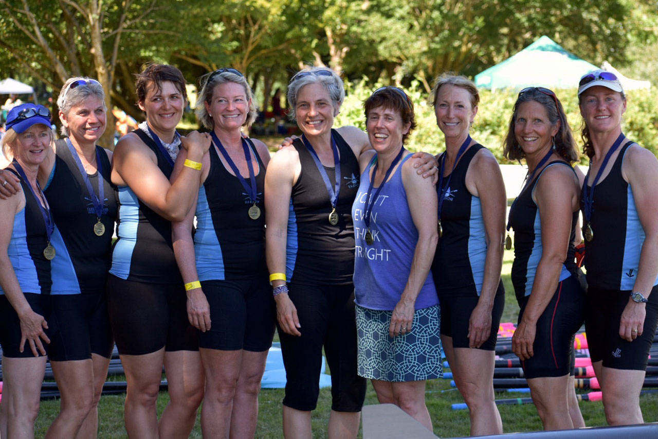 The crew of the winning women’s eight managed to slow down for a photo at Vancouver Lake last weekend. Pictured from left: Coxswain Lisa Huggenvik, stroke Kim Goforth, Erika Bartkute Lanske, Sarah Eden, Kit Gruver, Zabette Macomber, Norine Martinsen, Amy Bogaard and Lea Heffernan. (Courtesy Photo).