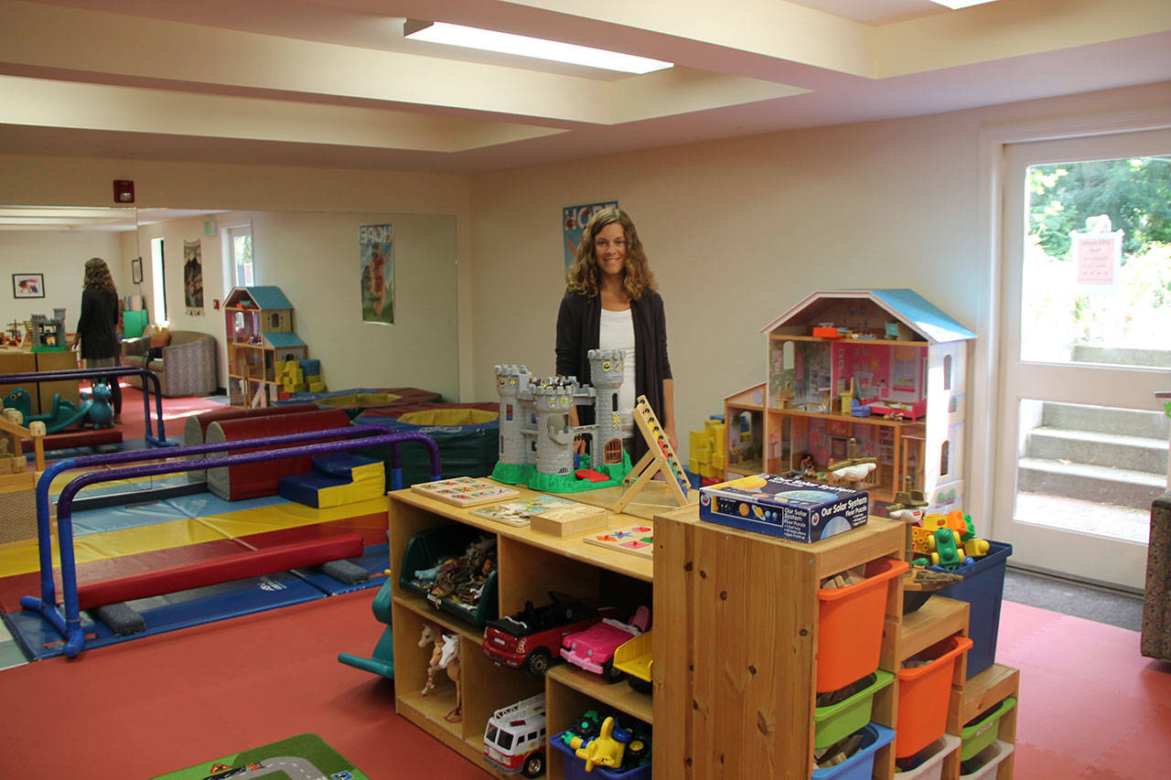 Christine Wood stands in VYFS’ new FamilySpace area in the former PlaySpace building. (Susan Riemer/Staff Photo)