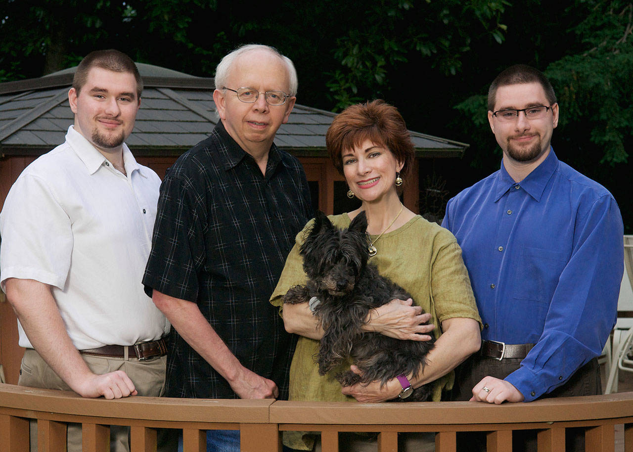 Mary Sage with her current husband, Michael, and her sons, Ryan and Ray Devlin. (Courtesy Photo)