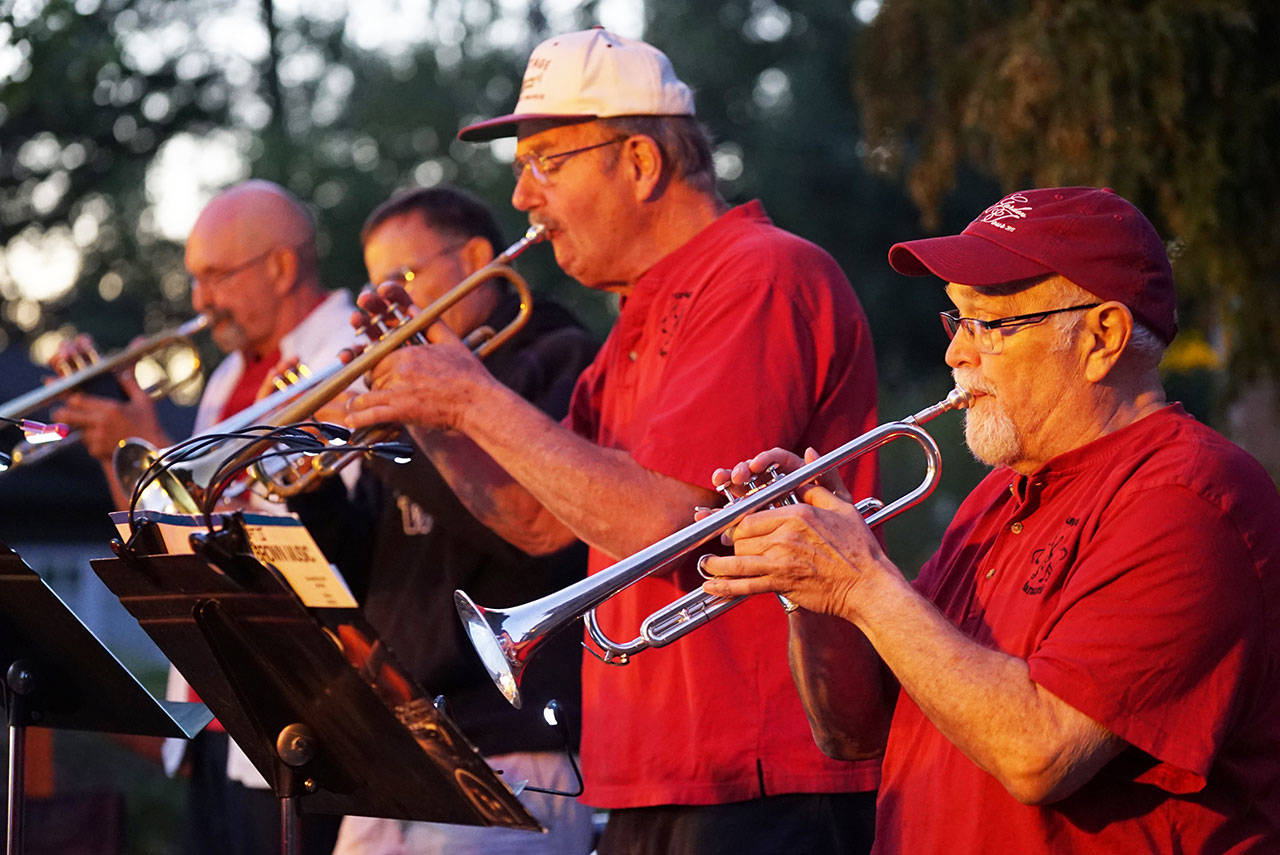 Portage Fill trumpeters, left to right, Robert Person, Dennis Williams, Lou Engles and Stuart Tribble play at the recent Concert in the Park. (Pete Welch photo)