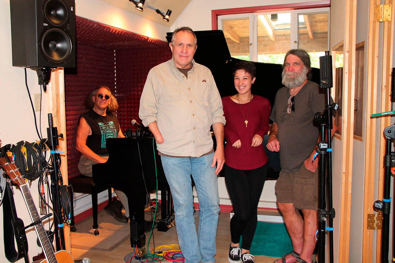 From left to right: Ike Harmon, Jeff Woollen, Callie Wong and Peter Ray at Woollen’s Village Sound Studio. (Juli Goetz Morser/Staff Photo)
