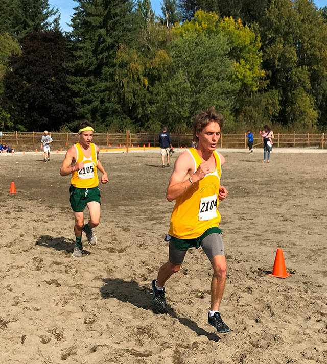 Vashon High School senior Gianno Waller (right), followed by sophomore Cole Parks (left) at Lake Sammamish State Park. (Courtesy Photo)
