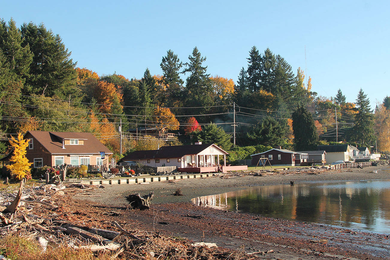 Climate change hits home Rising seas may claim hundreds of houses on