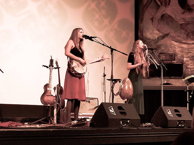 The Shook Twins, Laurie and Katelyn, performing at the Vashon Theatre last Wednesday. (Larissa C Clark Photo)