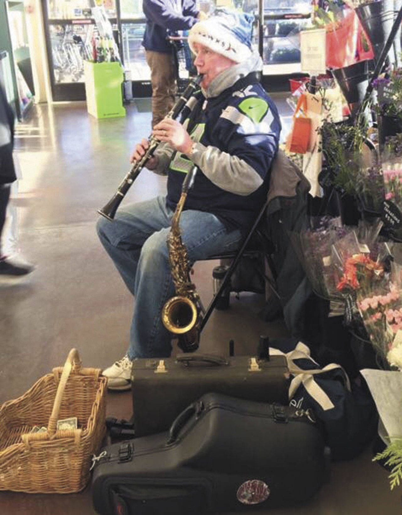 Charlie Kipp playing holiday music at Thriftway. (Courtesy photo)