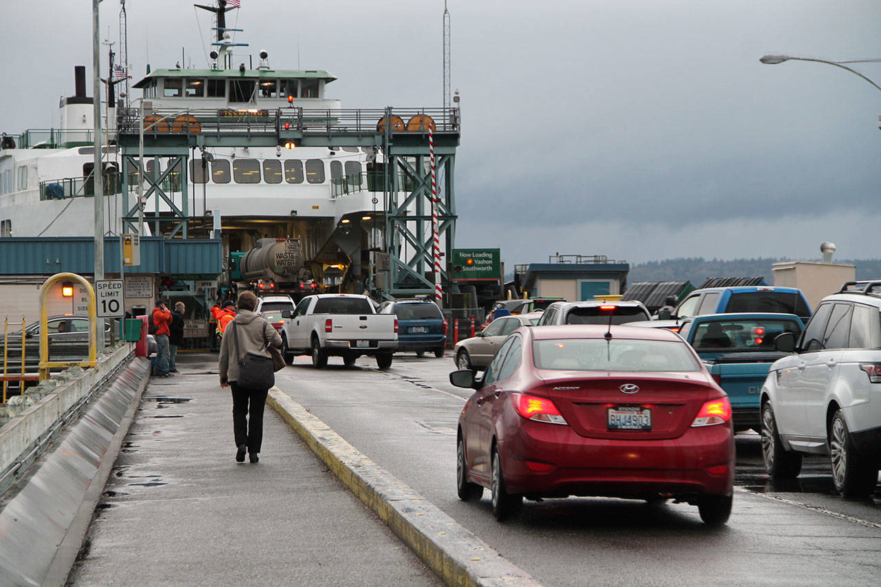 Cars loading onto a ferry at the Fauntleroy dock in January. (Susan Riemer/Staff Photo)
