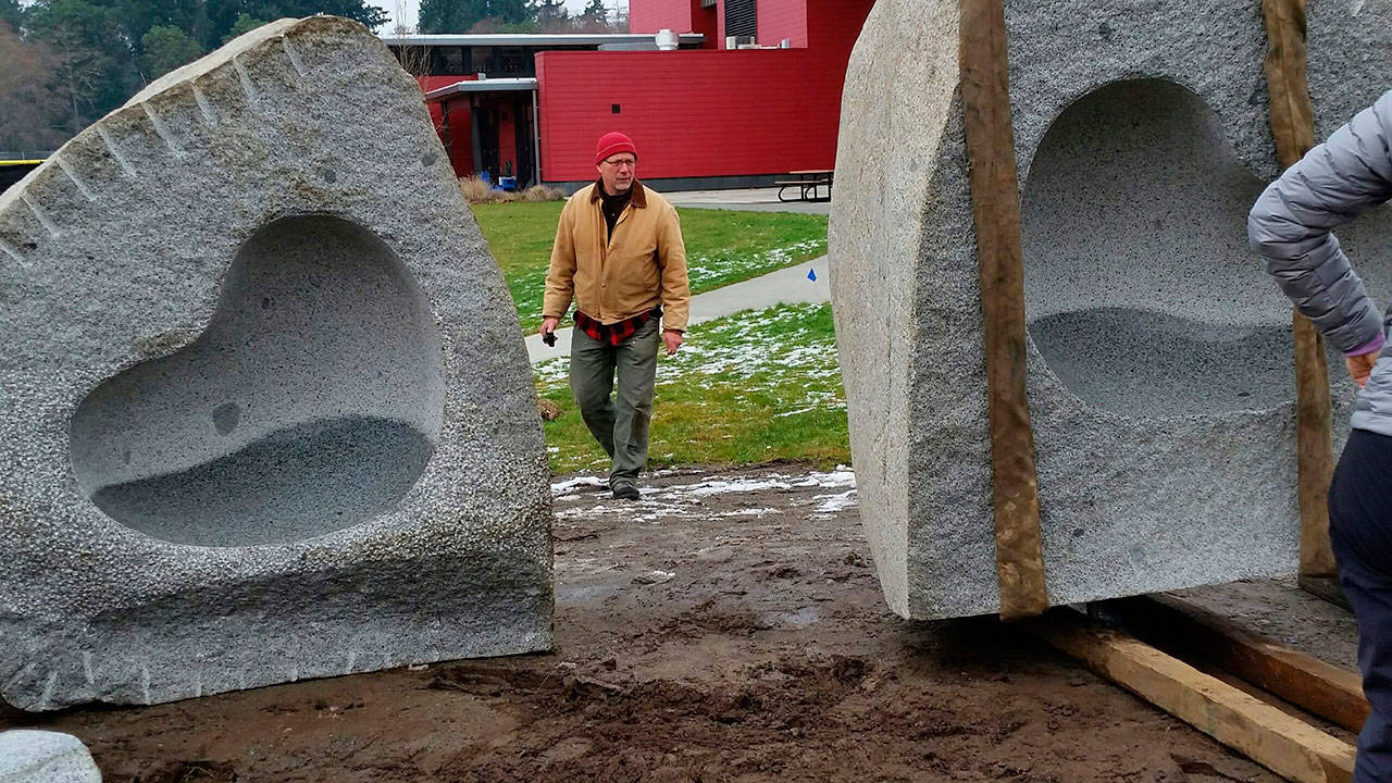 Bob Leverich with his “Way of Knowing” sculpture during its installation at VHS last week. (Danny Rock Photo)