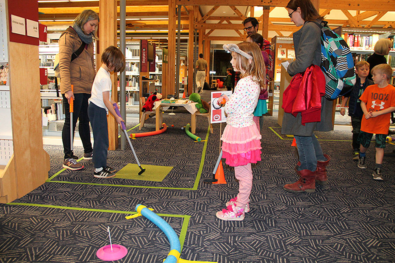 Mini-golf at the library: A Saturday night crowd pleaser