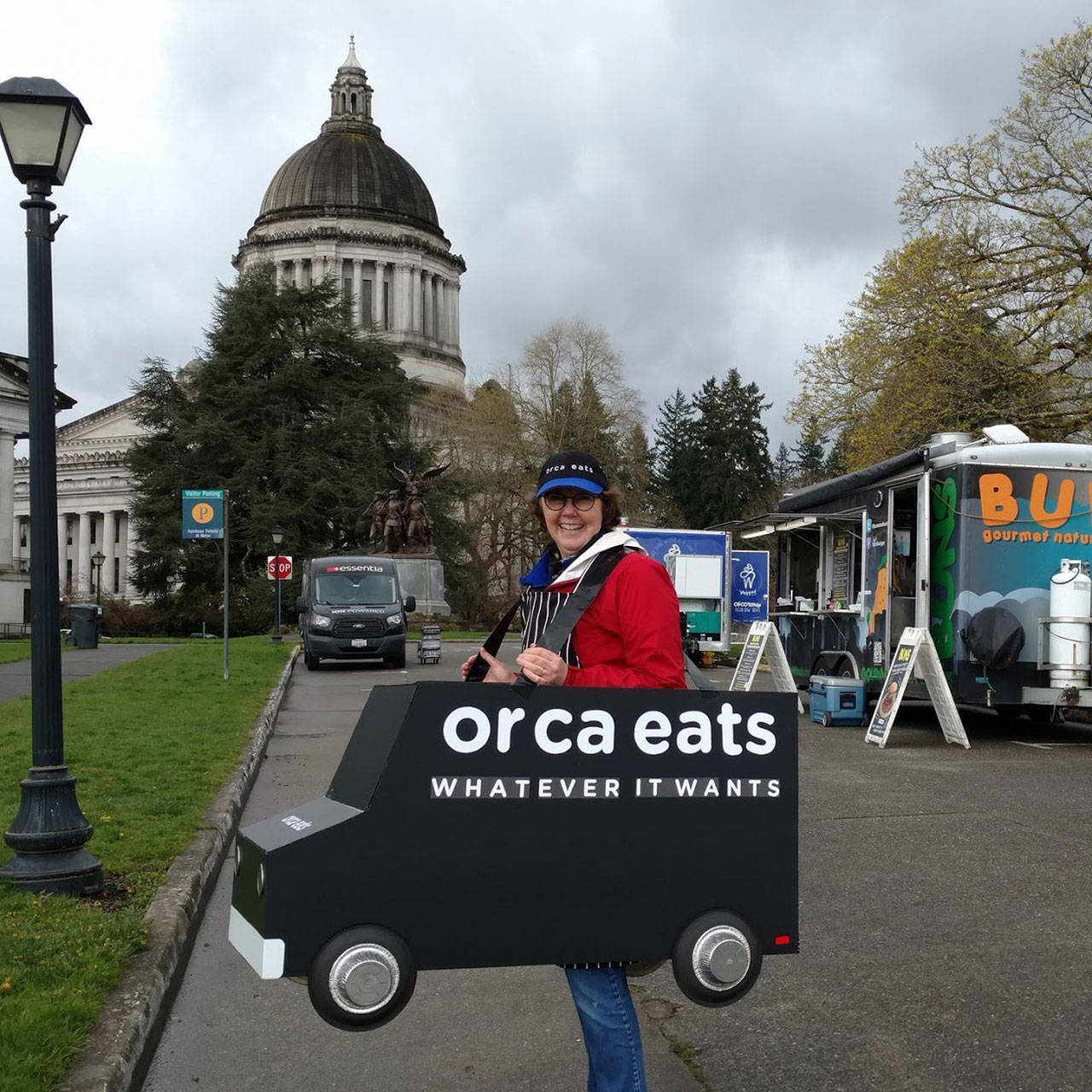 Emily Wigley donned the wearable version of her Orca Eats truck for Food Truck Lobby day in Olympia last April. (Courtesy Photo)