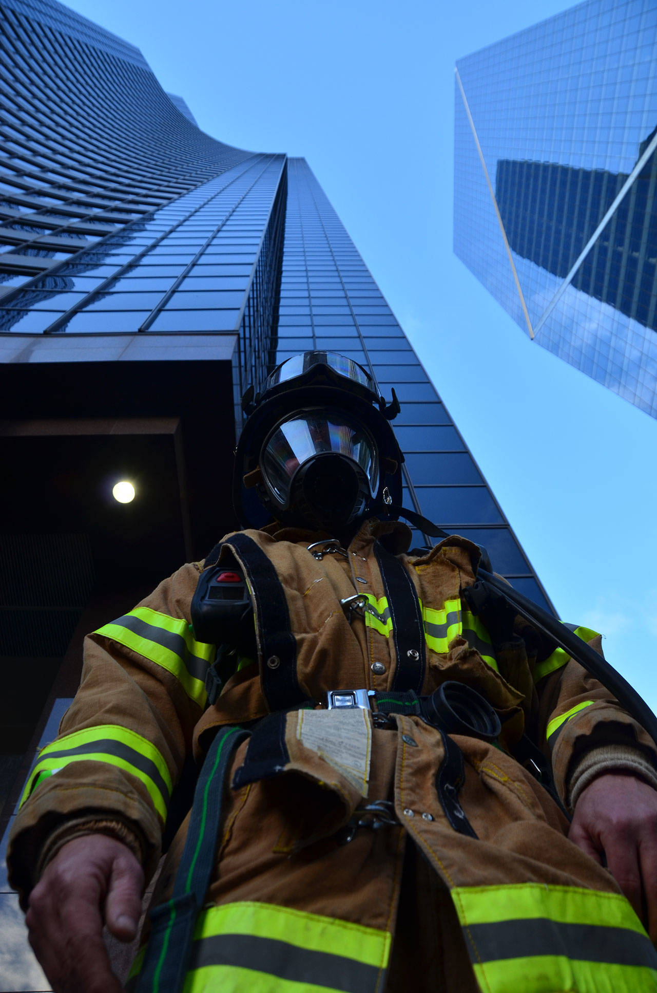 Andy Johnson stands at the base of the Columbia Tower before hitting the stairs (Jim Westcott Photo)