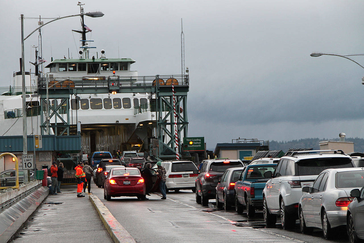 Loading the ferries at the Fauntleroy dock in less problematic during the off-peak travel months, but grows more challenging as the number of vehicles increases. An upcoming study conducted by the University of Washington may lead to new conclusions and practices there. (File photo)