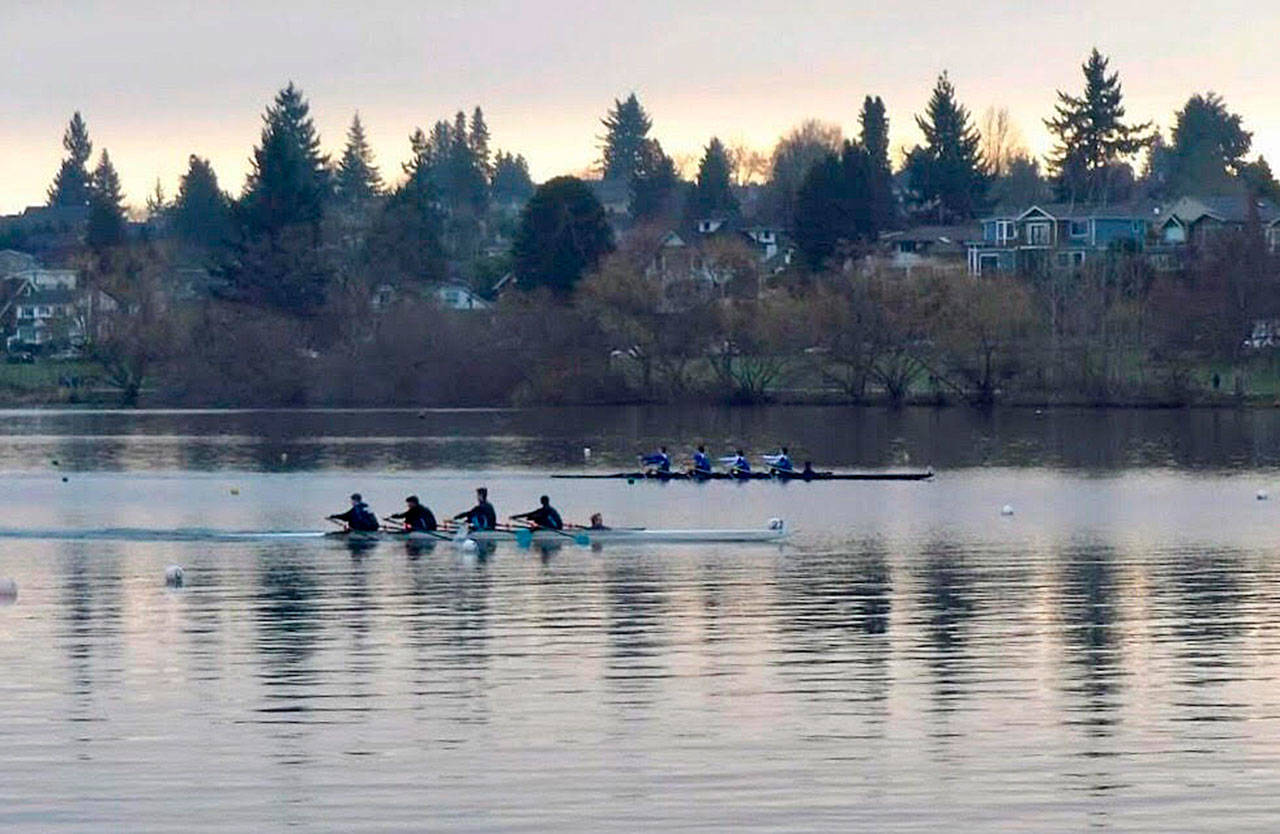 The men’s novice coxed quad, in the foreground, edges out Seattle Prep for the win at Saturday’s regatta. (Jennifer O’Meara Photo)