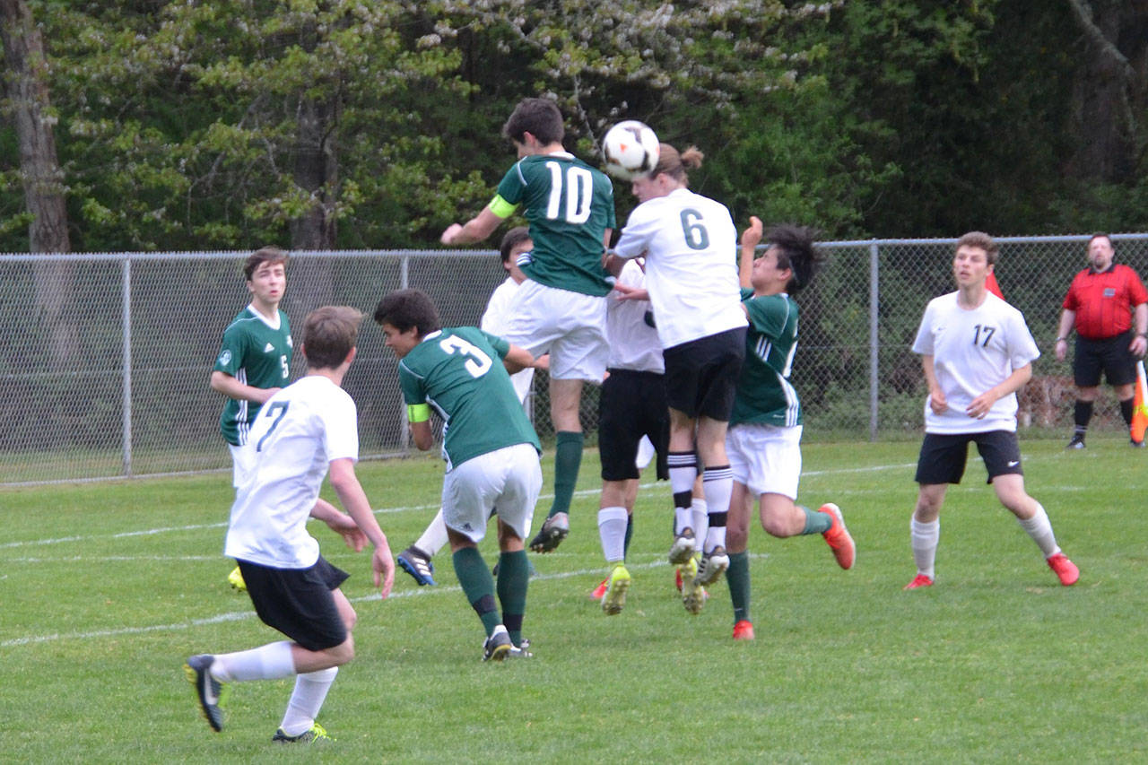 It was a fight to the finish at last Friday’s soccer game against Charles Wright. (Jim Westcott Photo)