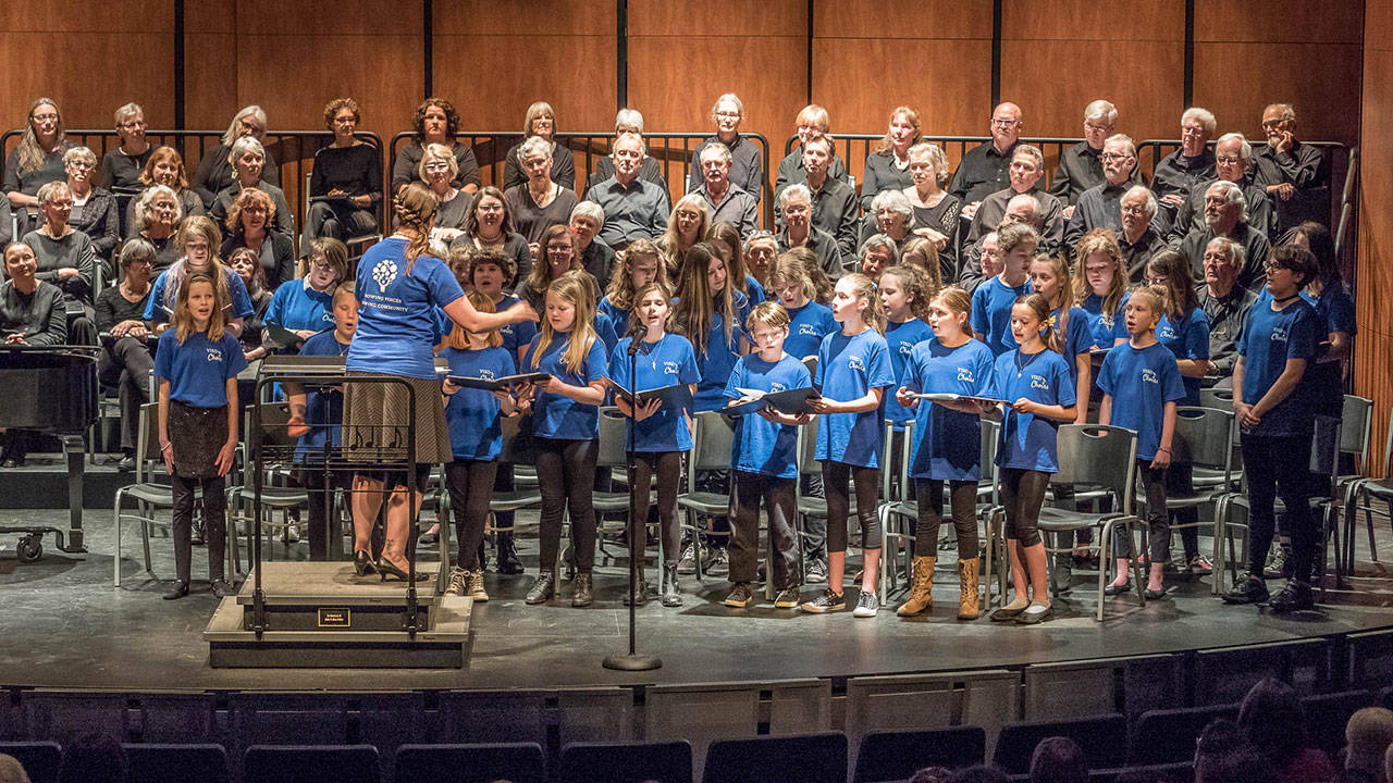 Chautauqua and McMurray singers perform together at the Vashon Island Chorale’s recent concert at VCA. (Shelly Hanna Photo)