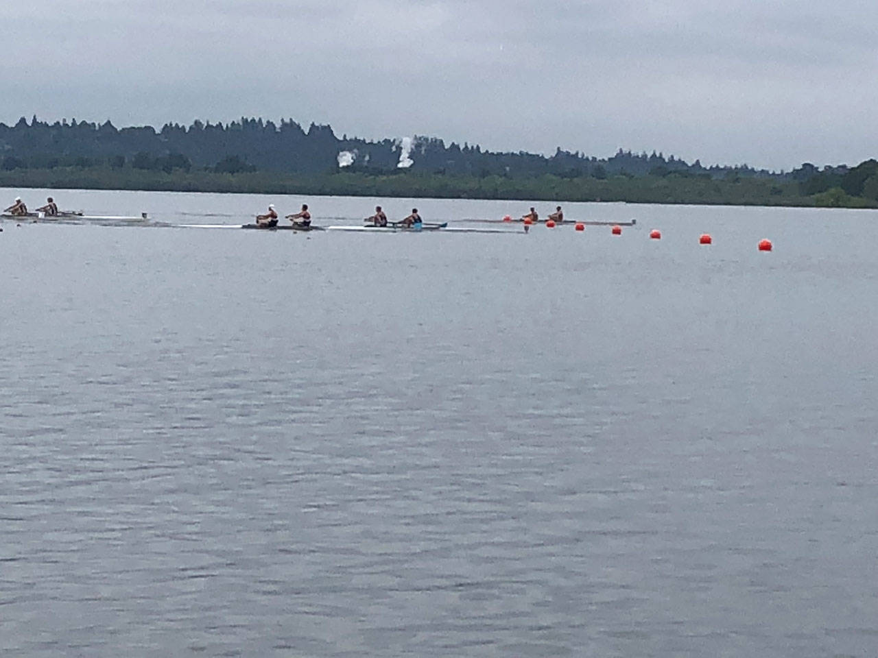 VIRC men’s varsity pair of Cooper Py and Tor Ormseth (blue oar blades) edge out the competition for third place at Northwest Junior Regionals last weekend, earning them an invitation to Nationals in June. (Martha Ormseth Photo)