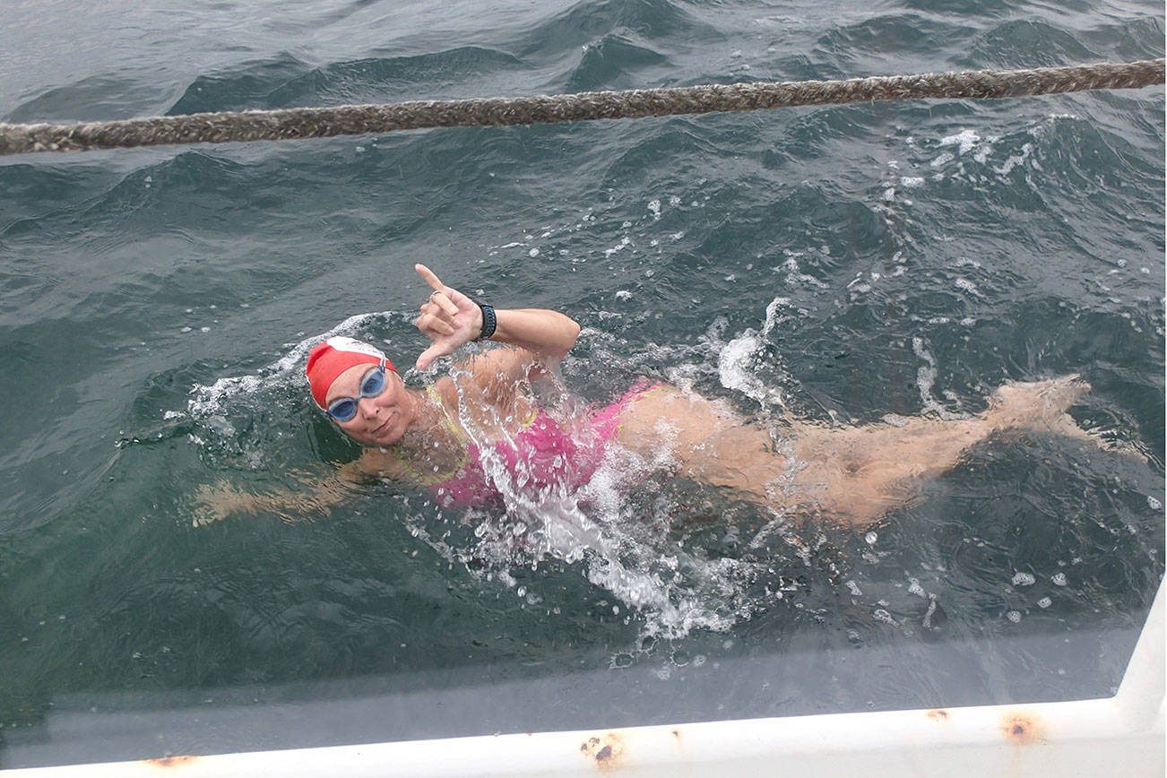 Against tide, island relay swim team crosses English Channel