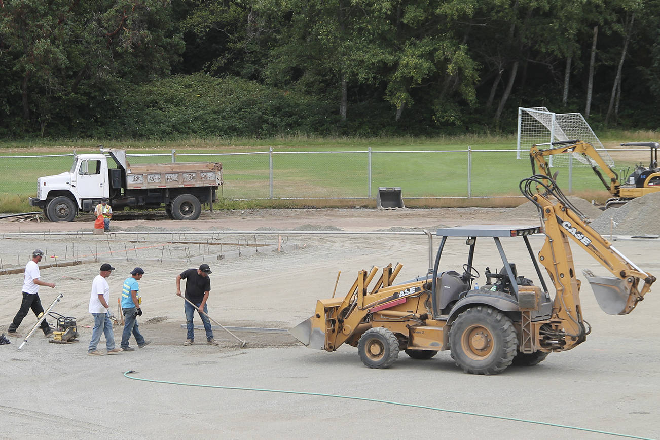 Work is in progress this summer at the Vashon High School track and field. Once the field is ready for the pad and turf, attention will shift to the track, grandstand and field events areas. (Susan Riemer/Staff Photo)