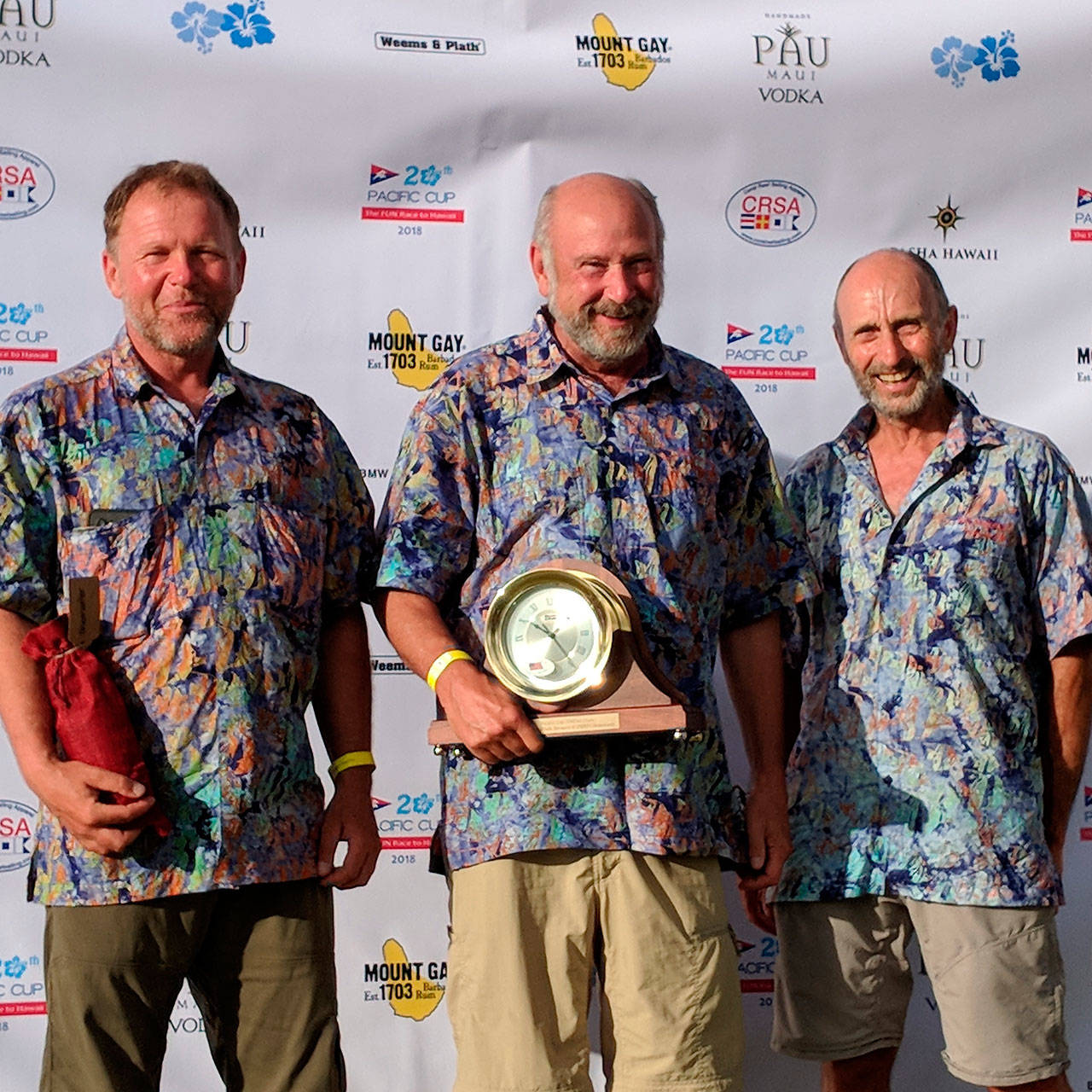 Stewart Putnam, Skipper Karl Haflinger and David Smullin on the podium for the first place award in the Weems & Plath division of the Pac Cup. (Courtesy Photo)
