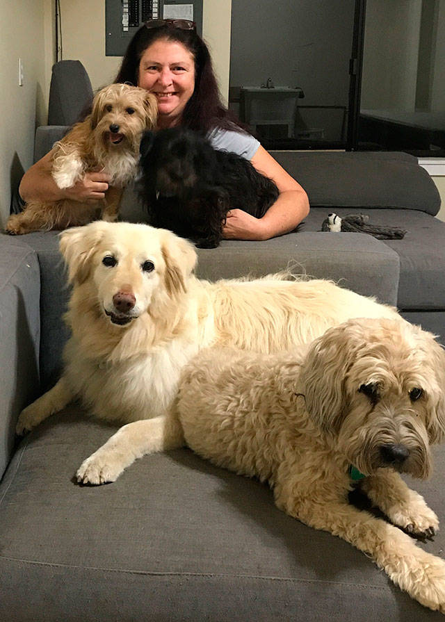 Tammy Thomas, at home with her own pups (Courtesy Photo)