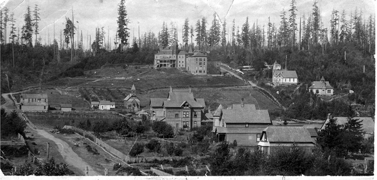 Courtesy photo                                The Burton Church, seen in this photo from 1898, is in the left center of the photo. Vashon College is on the hill above. To the right of the college is the Methodist Church; further right is the Burton Elementary School, and below the college is the Burton Missionary Children’s Home (Courtesy photo).