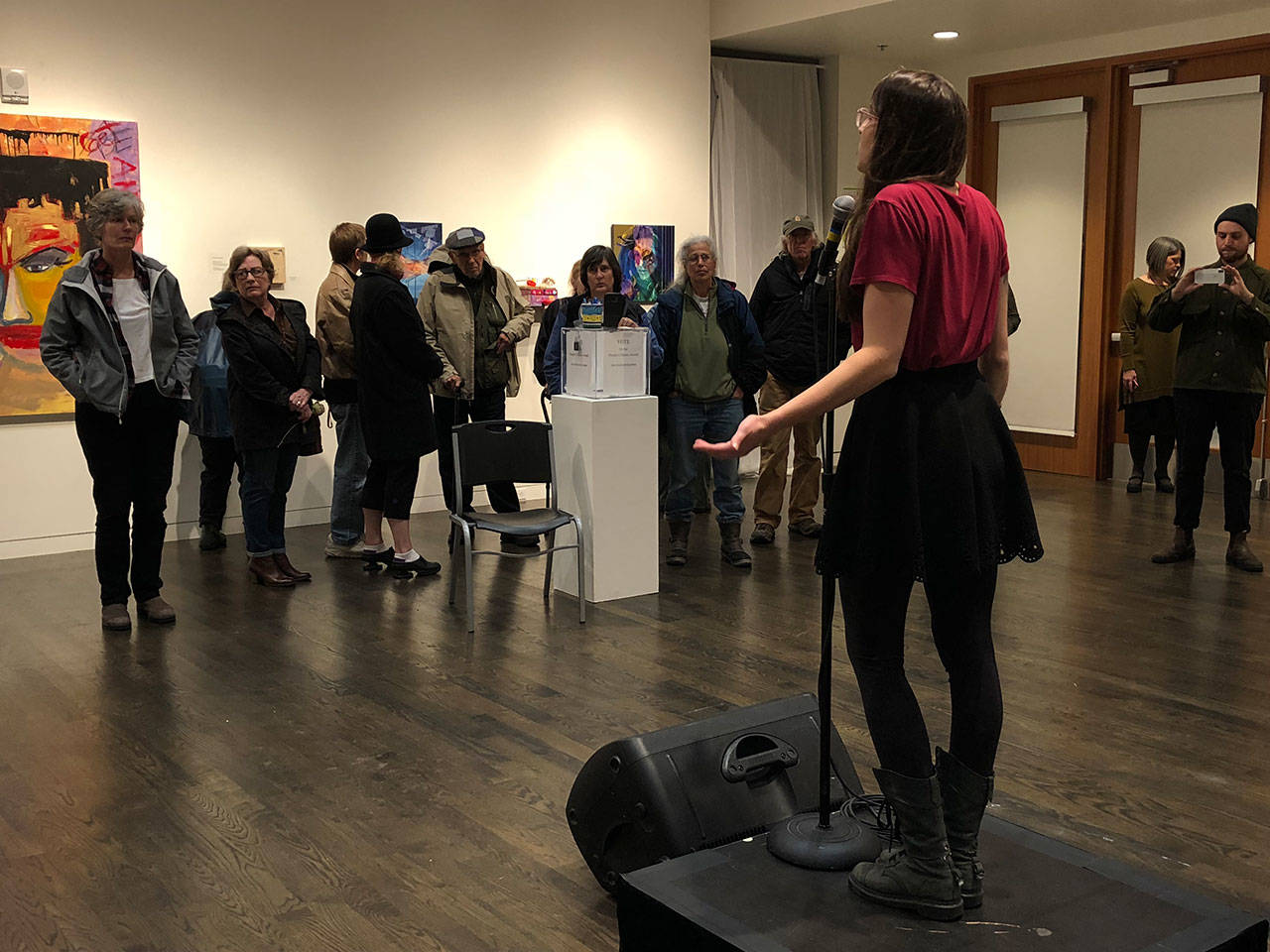 Emily Bruce, an islander, performed Eve Ensler’s monologue “My Short Skirt” at the opening of #MyMeToo, an exhibit that tackles responses to assault and abuse now running at Vashon Center for the Arts (Tom Hughes Photo).