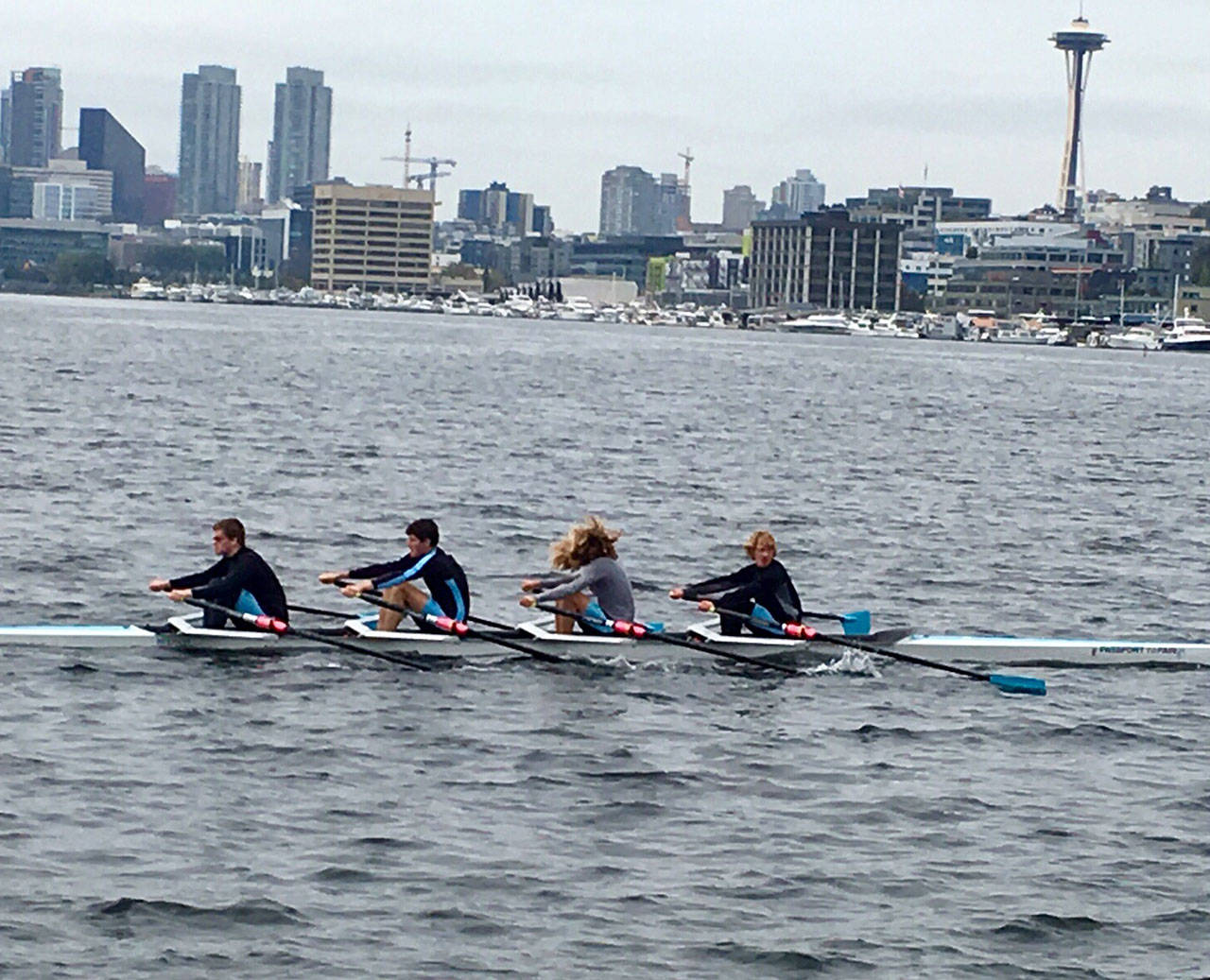 Lex Rosen, Nick Winkler, Baker Van Buren and Joshua Kyles on their way to a gold in the JV men’s 4X at the Tail of the Lake regatta on Sunday. (Courtesy Photo)