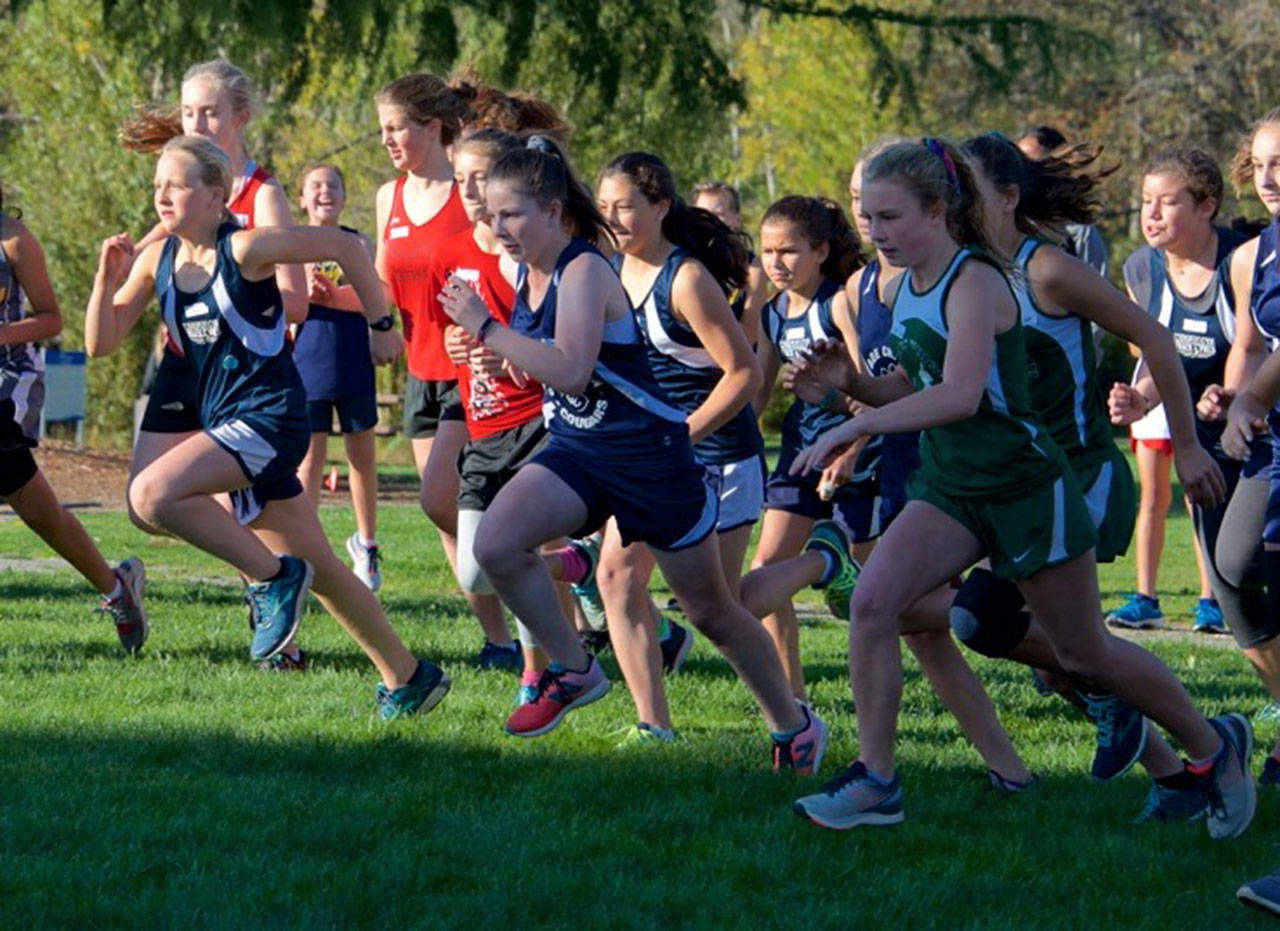 The Mustang girls team is led off the starting line in Titlow Park by Yarkin, Medeiros, Waterworth and Huffman (David Waterworth Photo).