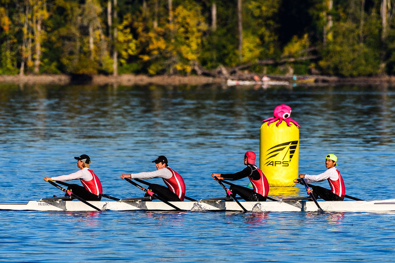 BBRC’s junior boys’ quad of Jordon Rutschow, Davis Kelly, Willem Brown and Brian DeLoach passing the course Kraken on their way to a bronze medal Sunday at American Lake (Steve Tosterud photo).