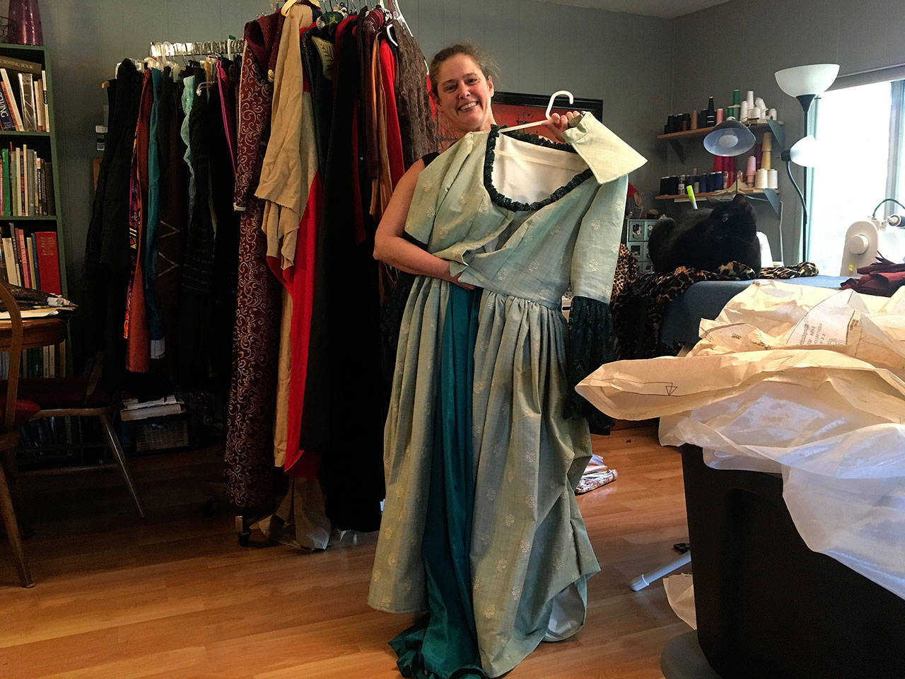 Sandra Cooper, of Vashon Costuming, shows off a ball gown she created for Vashon Center for the Arts’ “Masquerade” gala (Courtesy Photo).