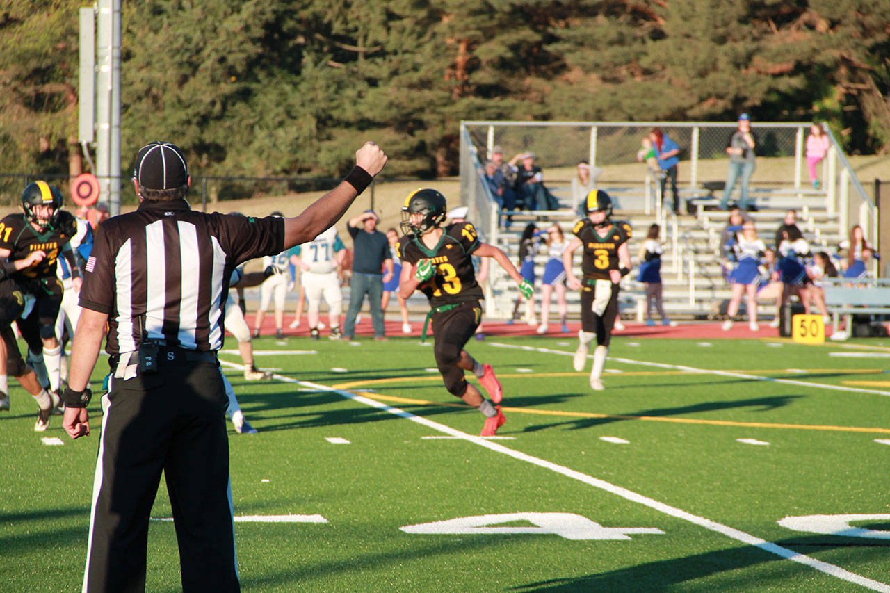 Pirates’ RB Zavier Delgado-Williams moves the ball during last Friday’s Homecoming win over Chimacum (Paul Rowley/Staff Photo).