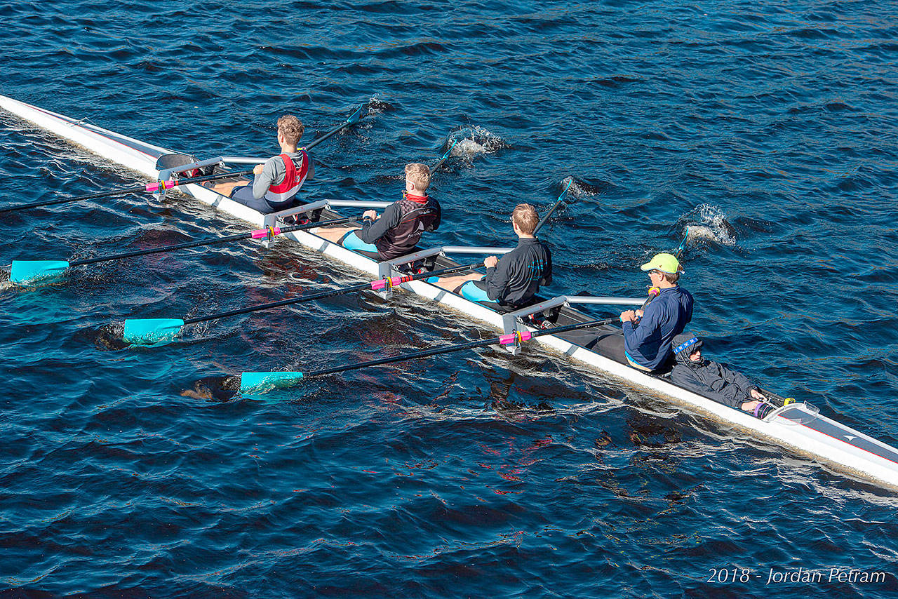 Vashon’s junior men’s quad warms up before its race and fourth-place finish at the prestigious Head of the Charles Regatta. From stern to bow: Tor Ormseth, Rohin Petram, Bowie Hichens, Oz Hichens and coxswain Aidan Teachout. (Jordan Petram Photo)