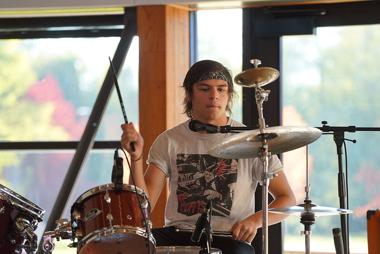 Jacob Bowden, who plays drums in the brother act called 20 Eyes, at a recent Sharing the Stage rehearsal (Pete Welch Photo).