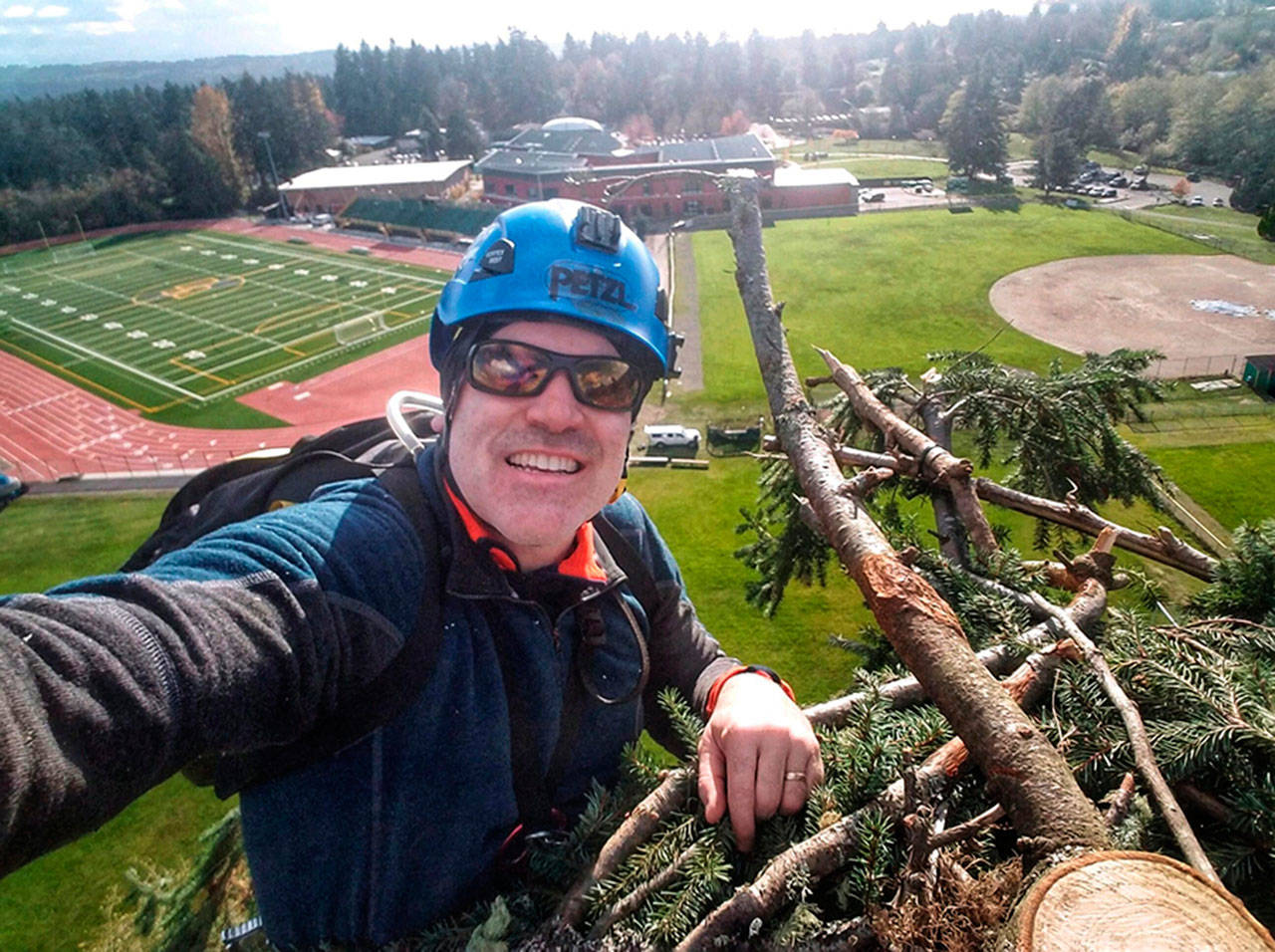 Tom Otto offers his bird’s eye view from the top of the 125-foot Douglas fir near the VHS field that he and partner Shaun Sears prepared as an alternative nest site for a pair of osprey (Tom Otto Photo).