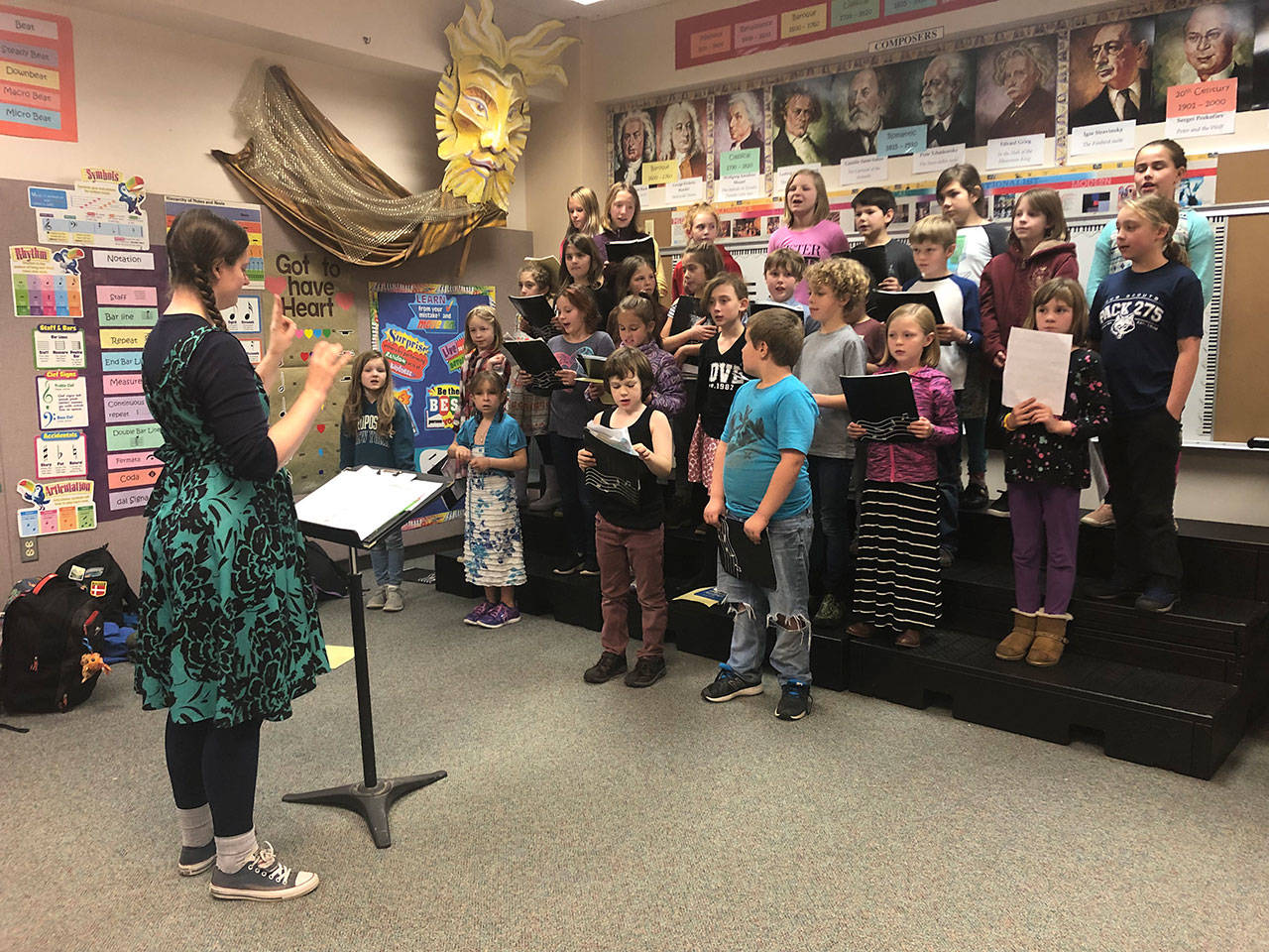 Erynne Smith readies the Chautauqua Elementary School choir for an upcoming concert (Tami Brockway Joyce Photo).