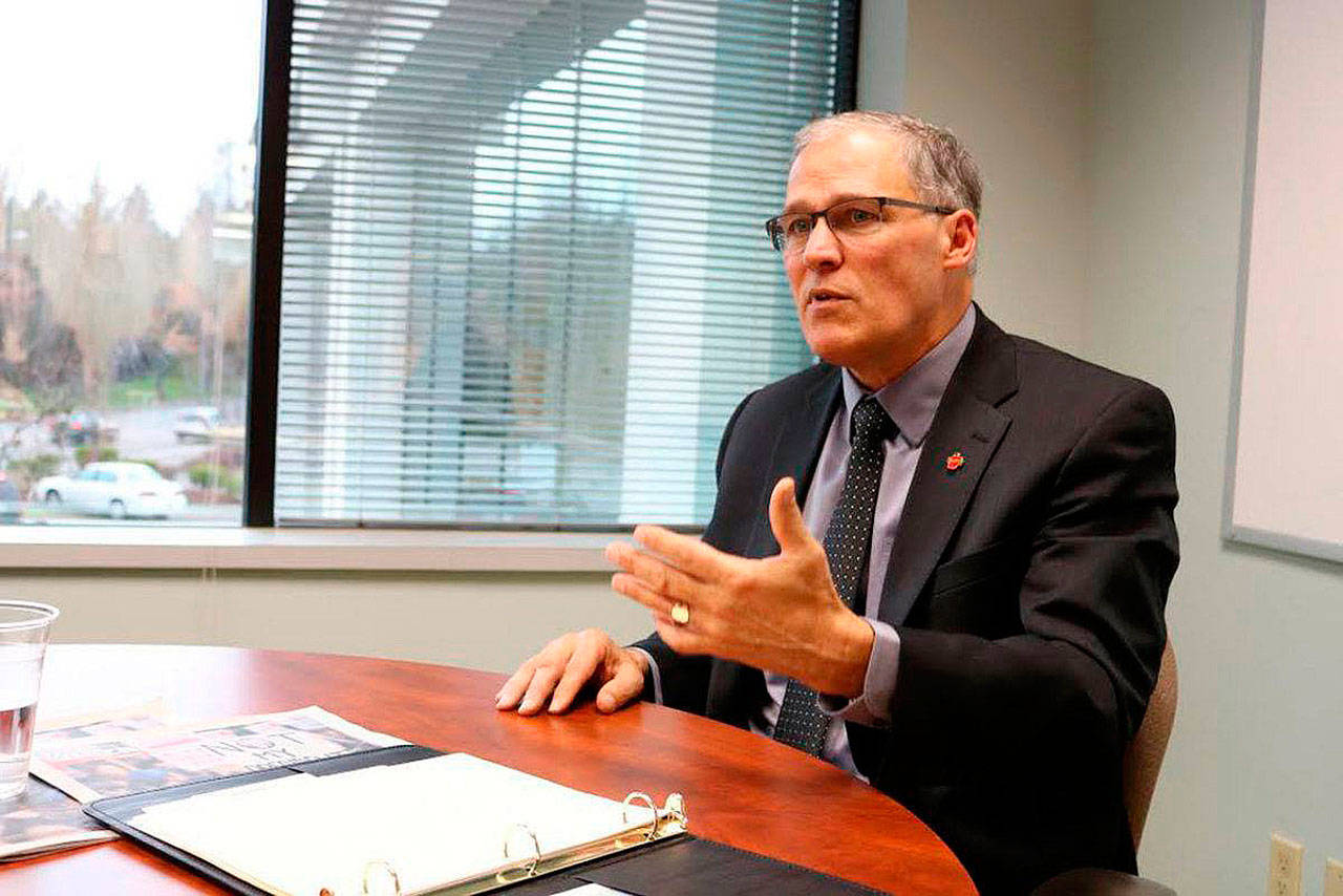 Gov. Jay Inslee at the Sound Publishing offices in Bellevue during a meeting in 2017. Inslee may be running for president in 2020 based on remarks published in The Atlantic and more than $112,600 in fundraising. File photo